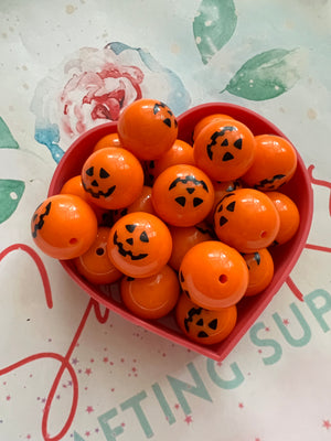 Orange Jack-o-lantern bead